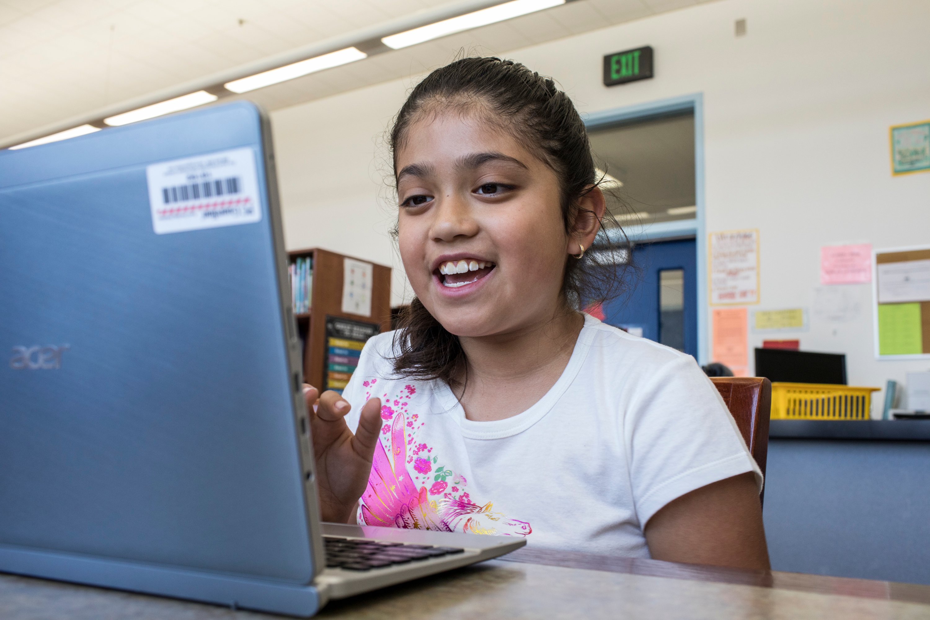 student in school smiling